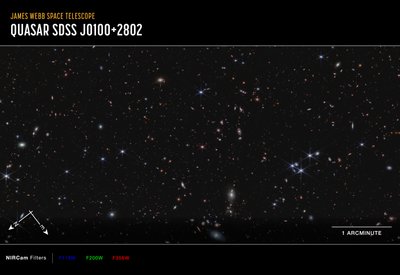 Quasar J0100+2802 (NIRCam Compass Image) av James Webb Space Telescope (NASA)