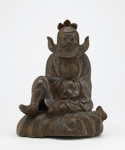 Figur av Shoki, demondämparen, sittande på en sten, Imbe, Okayama-prefekturen, Edo-perioden eller Meiji-eran (keramik) av Japanese School
