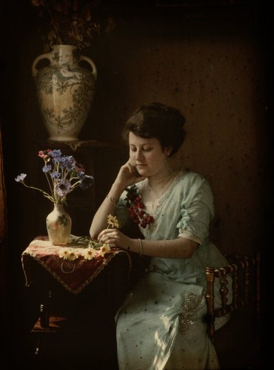 Kvinna med blommor av Johannes Hendrikus Antonius Maria Lutz