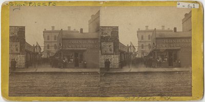 Vy över John R. Walsh Periodicals butik på Madison Street, Chicago med postkontoret i bakgrunden, 1869 av John Carbutt