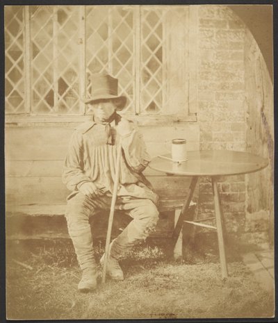 [Man som sitter vid bordet] av John Whistler