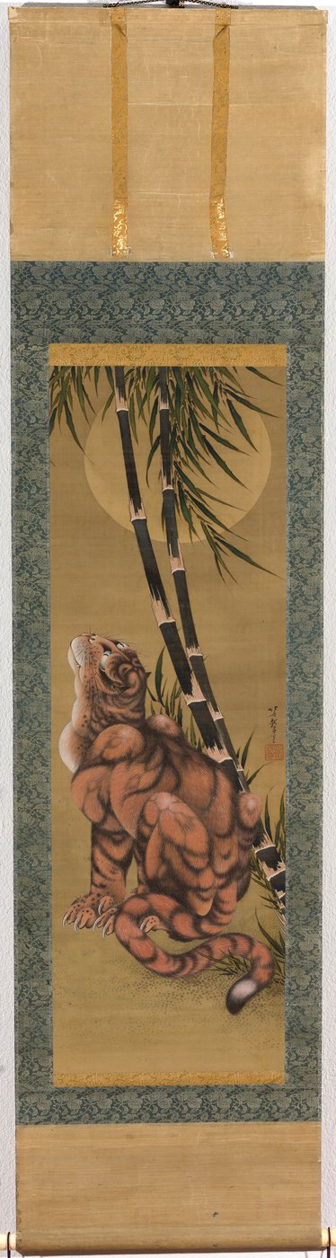 Tiger bland bambu som tittar på fullmånen av Katsushika Hokusai