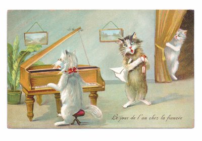 Edwardianskt vykort av en katt som spelar piano och den andra sjunger medan en tredje kikar ca 1910 av Louis Wain