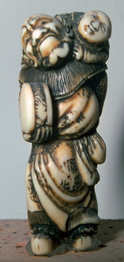 Japansk Netsuke av en kinesisk dansare och barn, 1700-talet. av Masahira