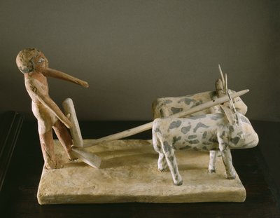 Begravningsmodell av en plogman som leder sin plog tecknad av två oxar (målat trä) av Middle Kingdom Egyptian
