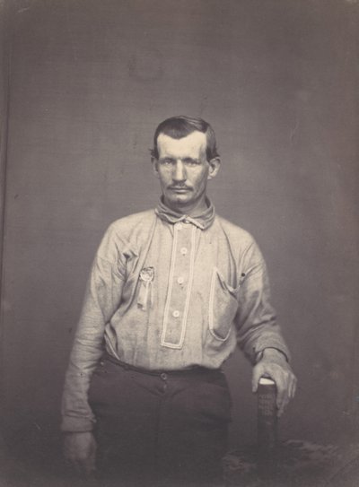 Man som håller patentbok, ca. 1857. av Oliver H. Willard.