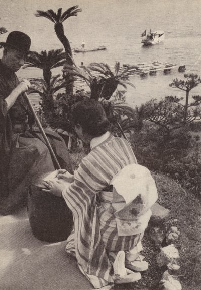 Japansk affärsman och hans sekreterare tar stenografiska anteckningar (s/v foto) av Photographer Japanese