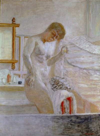 Naken står vid toaletten av Pierre Bonnard
