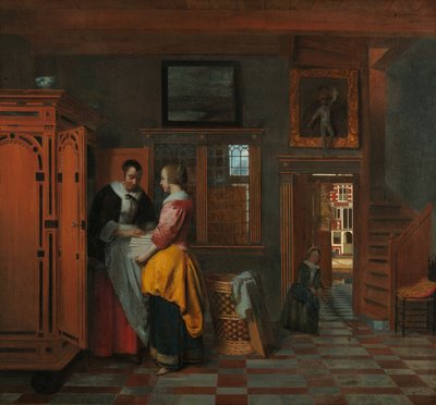 Interiör med kvinnor bredvid ett linneskåp av Pieter de Hooch