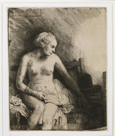 En kvinna vid badet med en hatt bredvid sig, 1658 av Rembrandt van Rijn