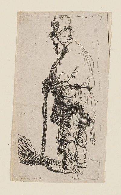 Tiggare lutad mot en käpp, vänd åt vänster av Rembrandt van Rijn