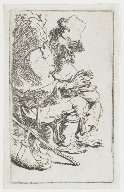 En tiggare som värmer händerna av Rembrandt van Rijn
