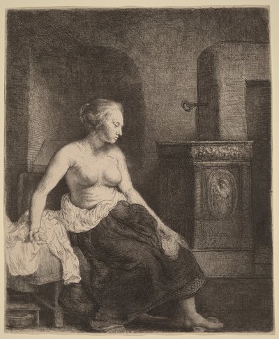 Kvinna som sitter halvklädd bredvid en kamin av Rembrandt van Rijn