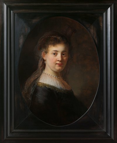 Ung kvinna i fantasidräkt av Rembrandt van Rijn