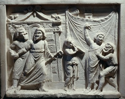 Relief av teaterscen från komedin 