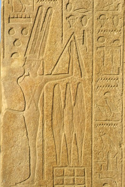 Forntida Egypten, Väggmålning/ristning, Guden Min, Karnaktemplet, Luxor, Fruktbarhetsguden, Håller i en slaga (foto) av School Egyptian