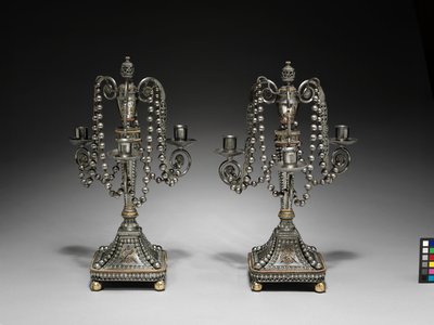 Ett par kandelabrar, ca 1790-1795 (slipat och polerat stål med guld- och försilvrad dekoration) av School Russian