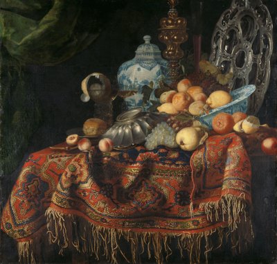 Stilleben med frukt, tallrikar och fat på en kalkonmatta av Simon Luttichuys (attributed to)