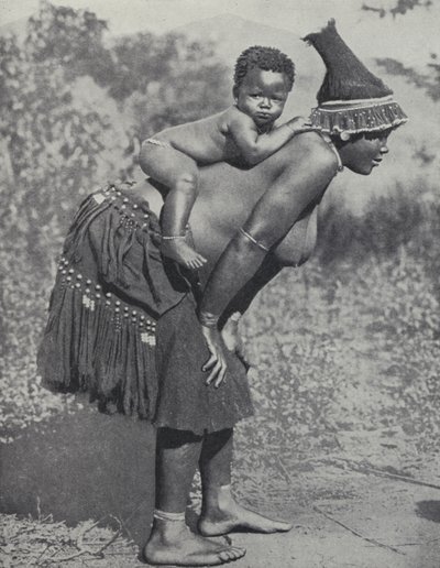 Kvinna som bär sin bebis på ryggen, Sydafrika (s/v foto) av South African Photographer