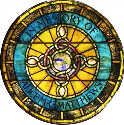 Ett cirkulärt blyat glasfönster av Tiffany Studios (blyat glas) av Studios Tiffany
