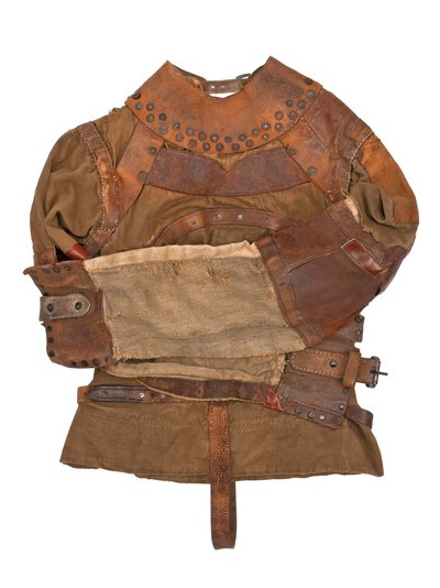 Tvångströja ägd av Harry Houdini, ca 1915 (khaki canvas, läder & metallnitar) av Swanfeldt Tent and Awning Co.