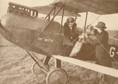 Med flyg till golflänkarna i ett litet 27-60 HP Moth Light Plane, 1927 av Unbekannt