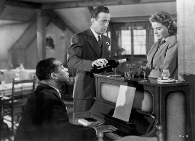 Ingrid Bergman, Humphrey Bogart och Louis Armstrong i Casablanca, 1942 av Unbekannt