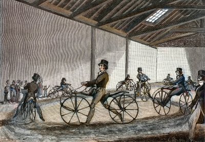 Invändig vy av manegen för hobbyhäst. Man kör cyklar (pedalfria cyklar uppfanns av baron Karl Drais av Unknown artist