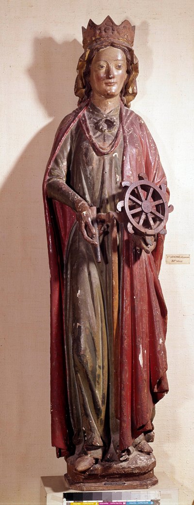 Representation av den heliga Katarina av Alexandria, som håller i hjulet för sin plåga. Polykrom trästaty av Unknown artist
