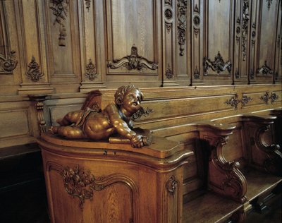 Barockarkitektur: trästall som föreställer en ängel, attribut för evangelisten Saint Mathieu. Kör (1700-talet) av St. Stefanskyrkan. Invändig vy. Marmoutier, Bas Rhin (67). av Unknown artist
