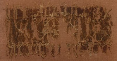 Fragment av en Tiraz av Unknown artist