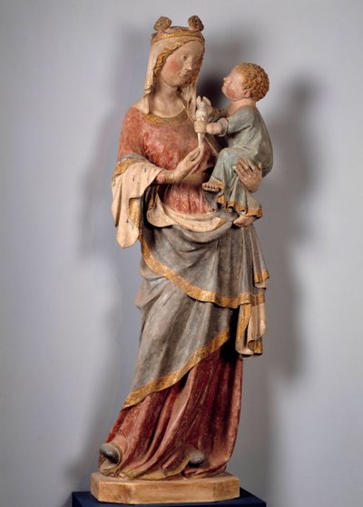 Jungfru och barn Barnet håller i duvan. Polykrom stenskulptur från början av 1300-talet. Champeuil, församlingskyrka av Unknown artist