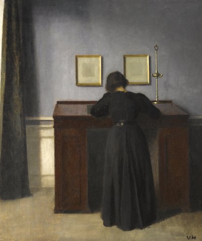 Ida står vid ett skrivbord, 1900 av Vilhelm Hammershoi