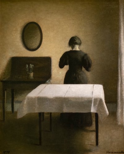 Interiör med en rygg kvinna av Vilhelm Hammershoi