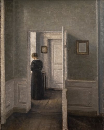 Interiör med en kvinna stående (olja på duk) av Vilhelm Hammershoi