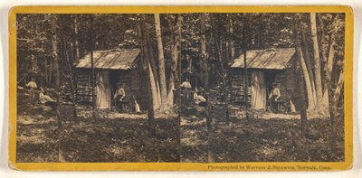 [Familjen poserar framför sin timmerstuga i skogen] av Whitney and Beckwith