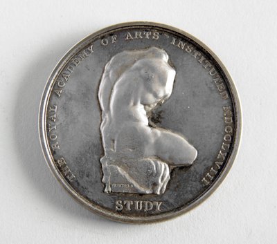 R.A. medalj tilldelas George Frampton 10.12.1884 för bästa modell av en figur (metall) av William Wyon