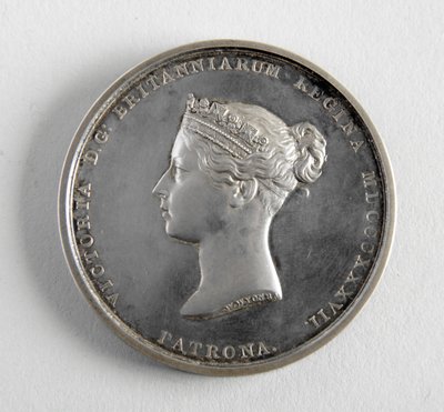 R.A. medalj tilldelas George Frampton 10.12.1884 för bästa modell av en figur (metall) av William Wyon