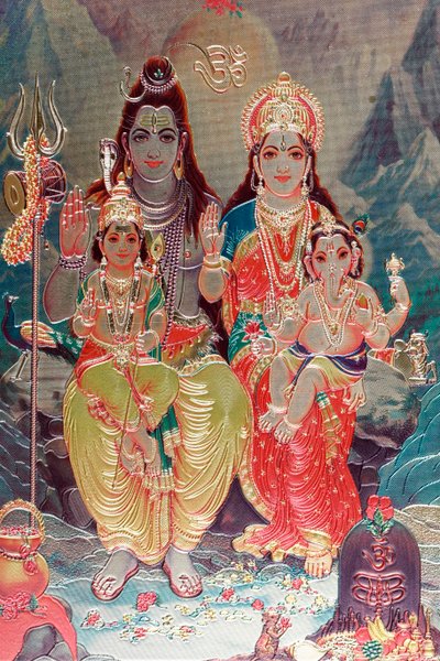 Gud Shiva och gudinnan Parvati med sin son Ganesha. av . .