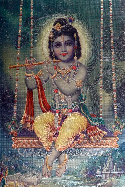 Lord Krishna med flöjt. hinduisk gud. av . .
