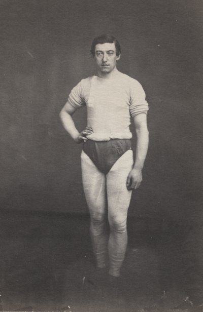 Ung man i atletisk outfit av attributed to Oliver H. Willard