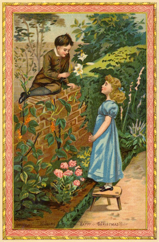 Pojke sitter på en vägg och erbjuder blommor till en flicka av American School