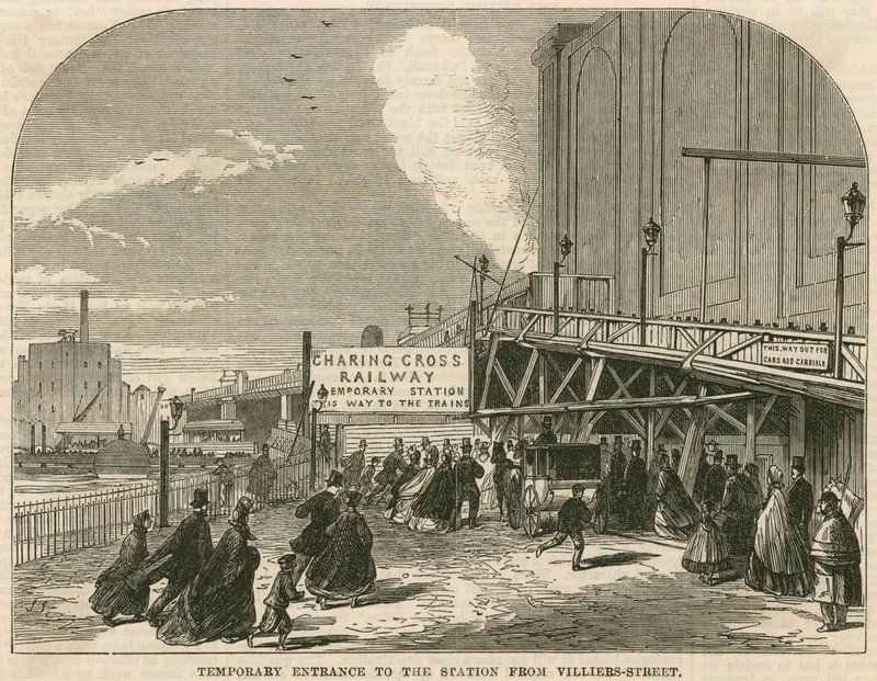 Charing Cross Station, London: Den tillfälliga ingången till stationen från Villiers Street av English School