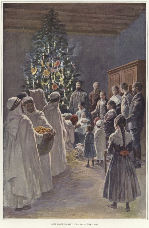 En familjegrupp som tittar på en julkrubba vid en julgran av French School