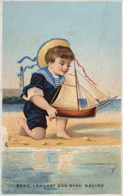 Pojke leker med leksak segelbåt av French School