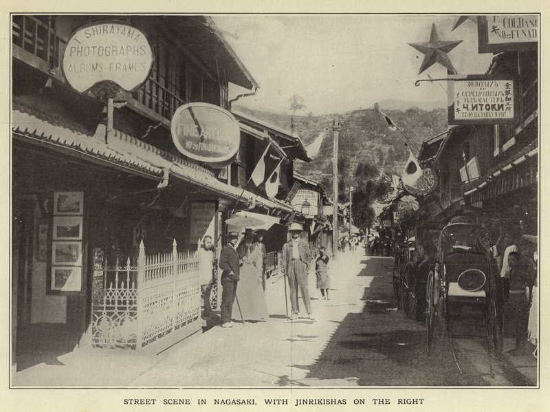 Gatubild i Nagasaki, med Jinrikishas till höger av Japanese Photographer