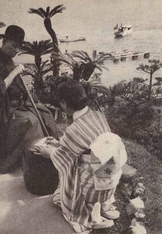 Japansk affärsman och hans sekreterare tar stenografiska anteckningar (s/v foto) av Photographer Japanese