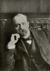 Porträtt av den franske målaren Emile Friant ( 1863