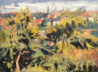 Liten stad bakom träd
