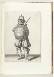 Sköld- och spikövningen: Soldaten som står i vila, hans gripare vilar på vänster axel bakom skölden (nr 23), 1618 Nassausche Wapen-Handelinge, van Schilt, Spies, Rappier and the Targe: beyde figuerlick avbildad, slut inramad efter n